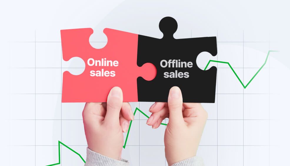 Hands holding puzzle pieces labeled "Online sales" and "Offline sales," representing the integration of these sales channels